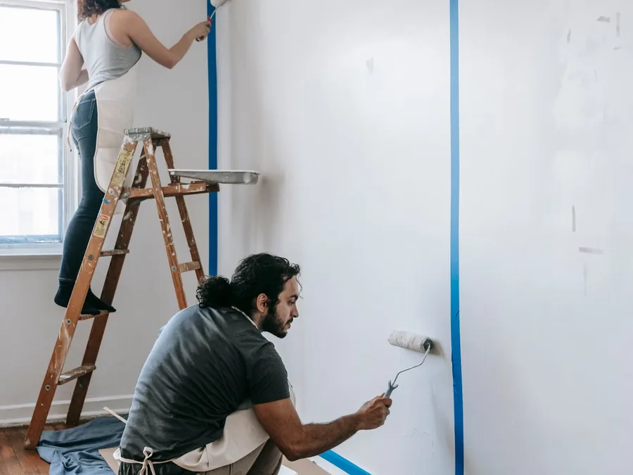 Homeowners planning a room repaint project